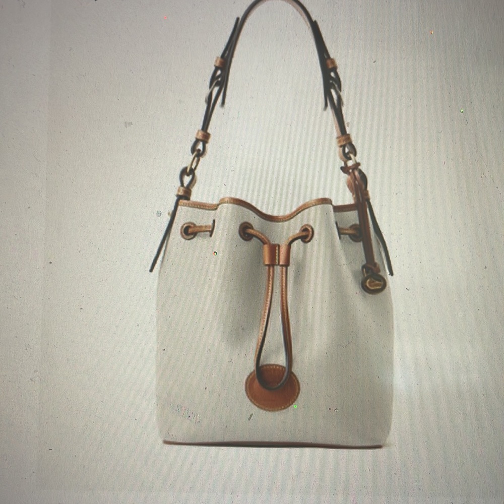 Dooney & Burke All weather leather 3.0 Drawstring 25. Vanilla color Style